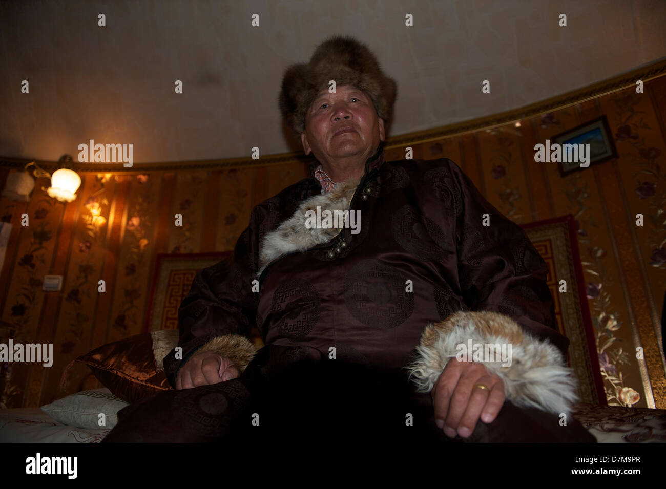 mongolian dad in his brick yurt in Ulan Bator Stock Photo
