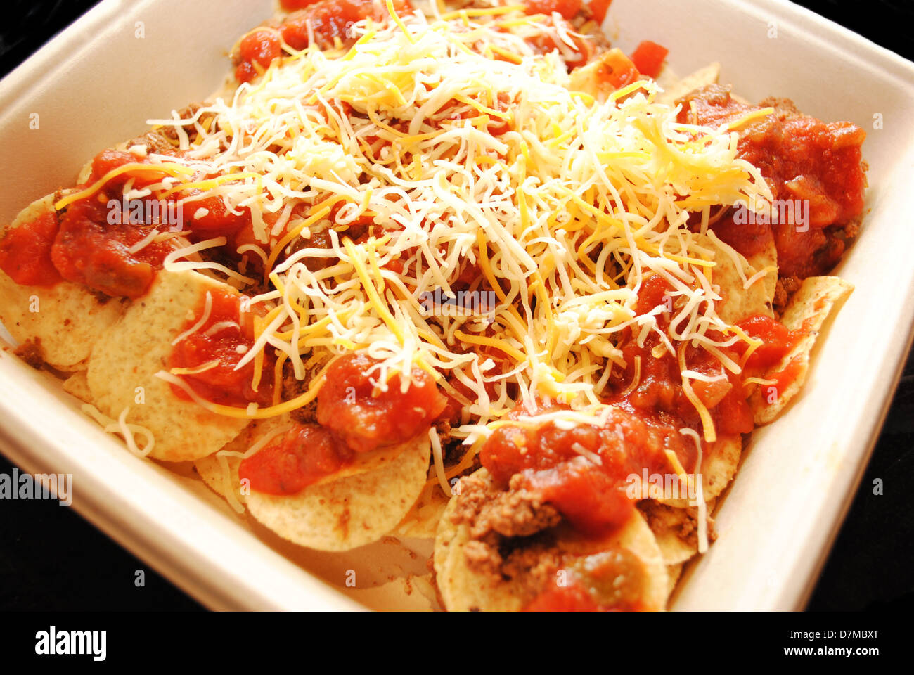 Cheesy Coen Chips with Salsa and Cheese Stock Photo Alamy
