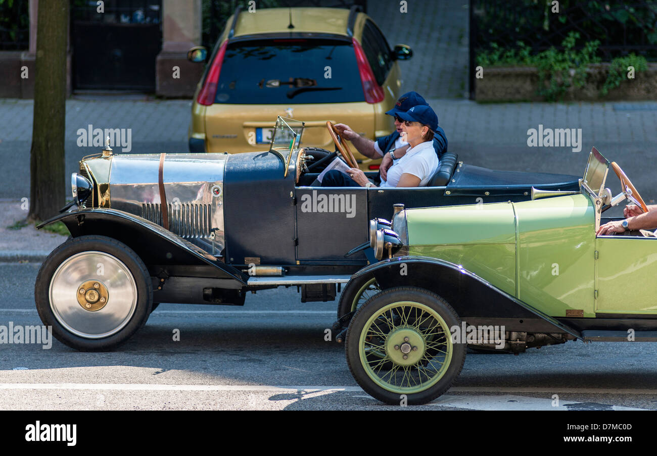 Couple driving a 1924 convertible Mathis Torpedo Sport PS 'Dickey' French vintage car Stock Photo