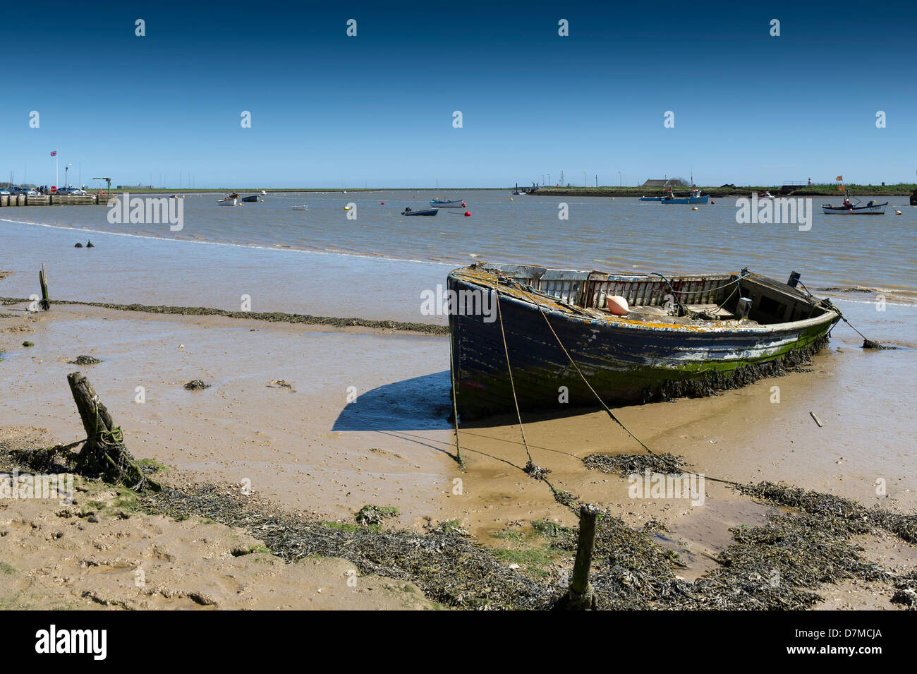 The remains of a boat wreck on the banks of the River Ore. Stock Photo