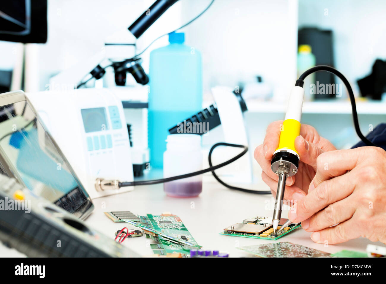 Soldering a circuit board Stock Photo Alamy