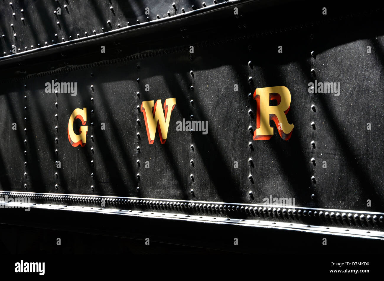 GWR - Great Western Railway lettering on wartime black painted tender of  steam loco in the running shed, Didcot Railway Centre Stock Photo - Alamy