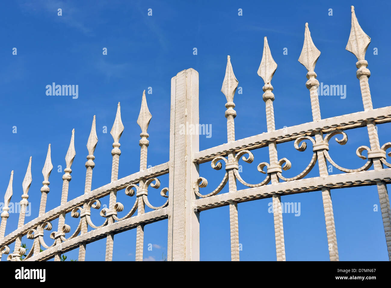 wrought iron gate made ??of metal, fence Stock Photo