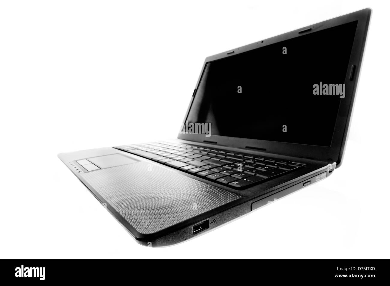 Black laptop open on a white background. Stock Photo