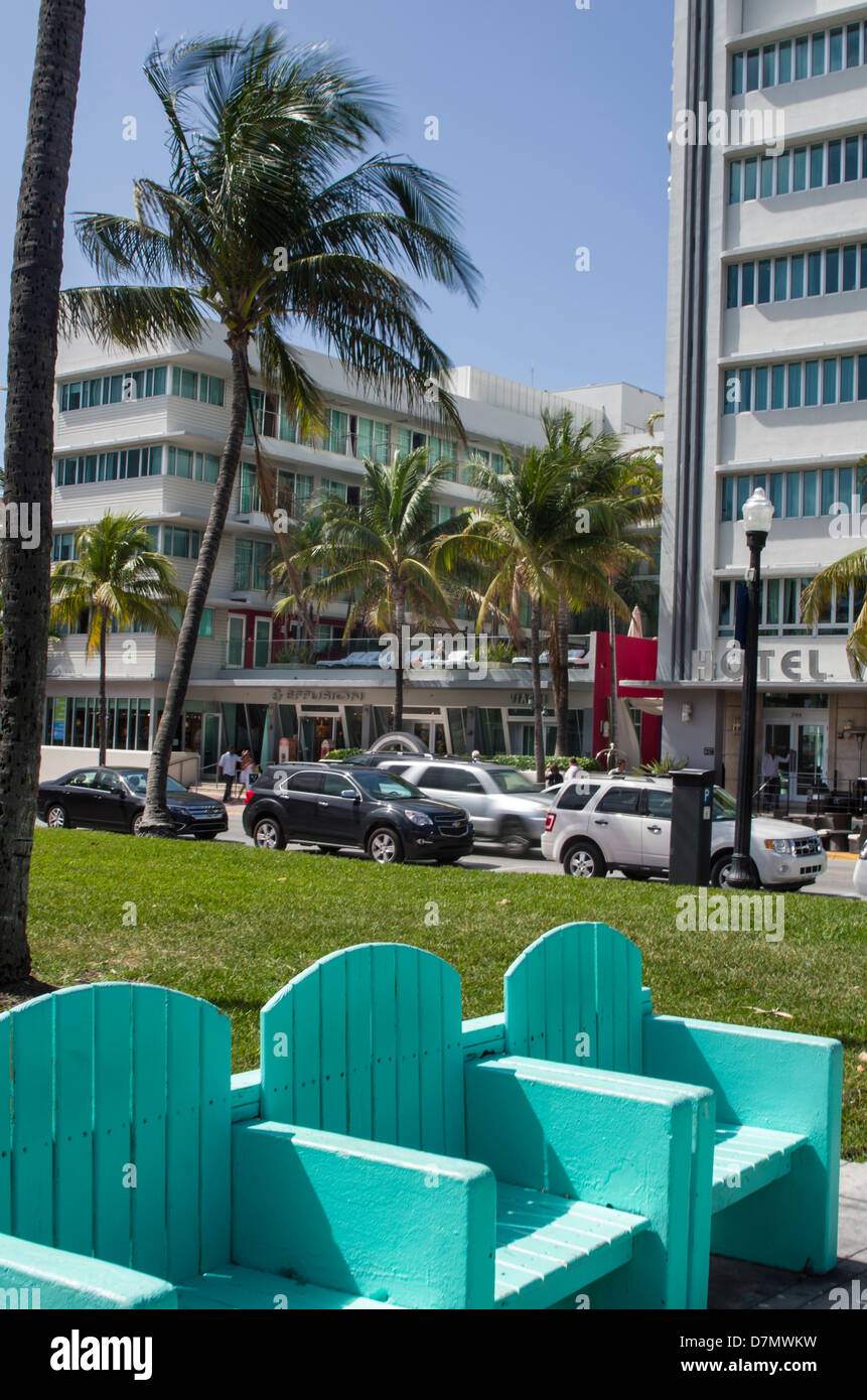 USA, Florida, Miami Beach. Lummus Park chairs echo art deco architectural theme of South Beach. Stock Photo