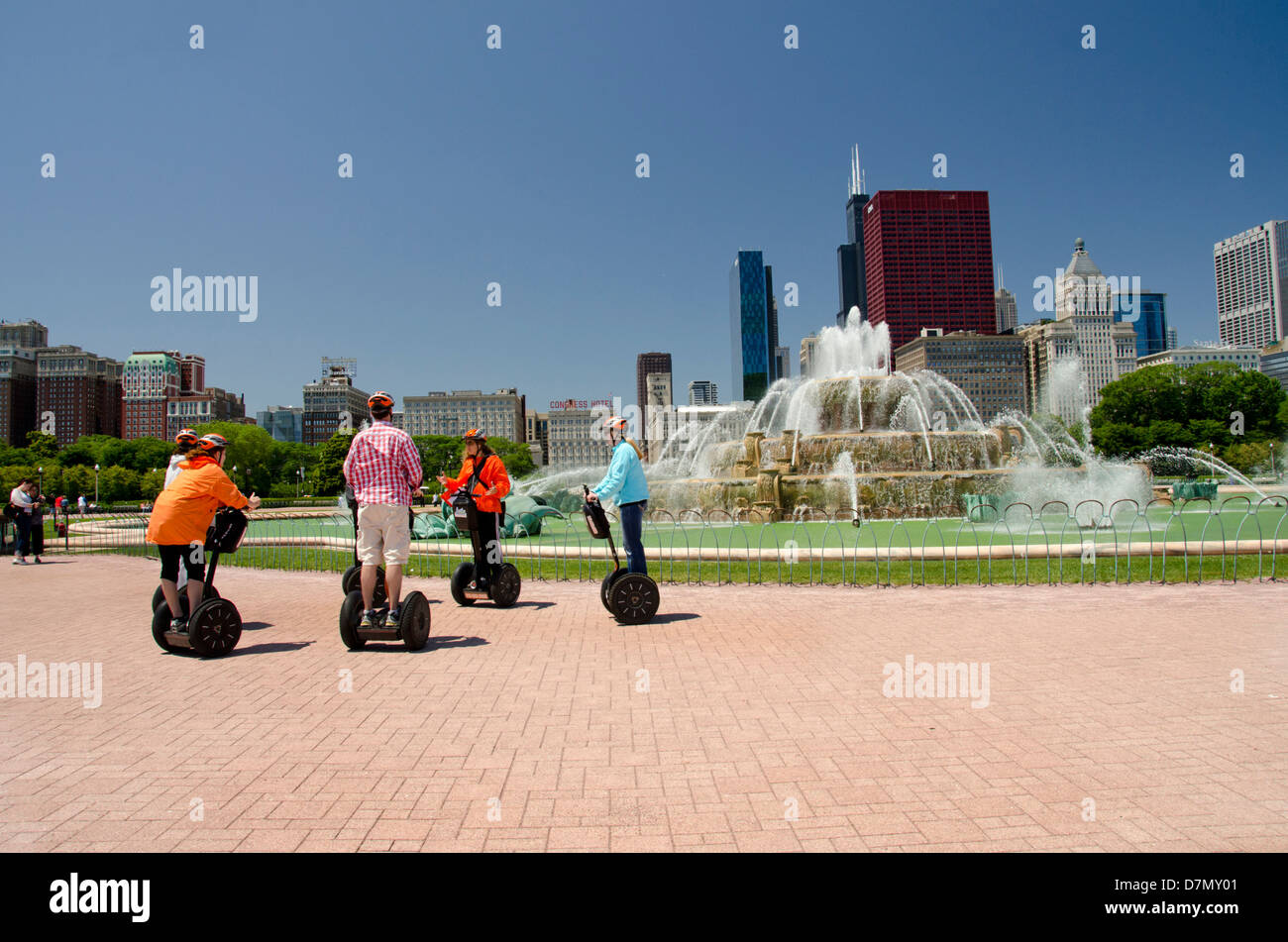 Illinois, Chicago. Segway tour in front of historic downtown fountain in Grant Park. Stock Photo