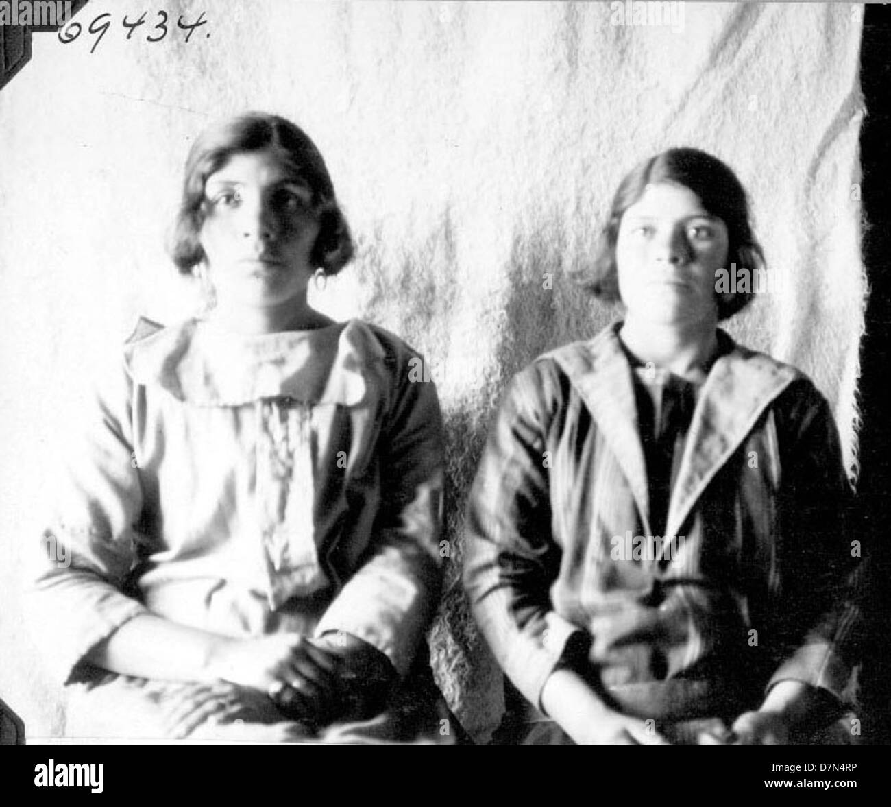 Two girls are seen collecting fossils during the Marshall Field ...