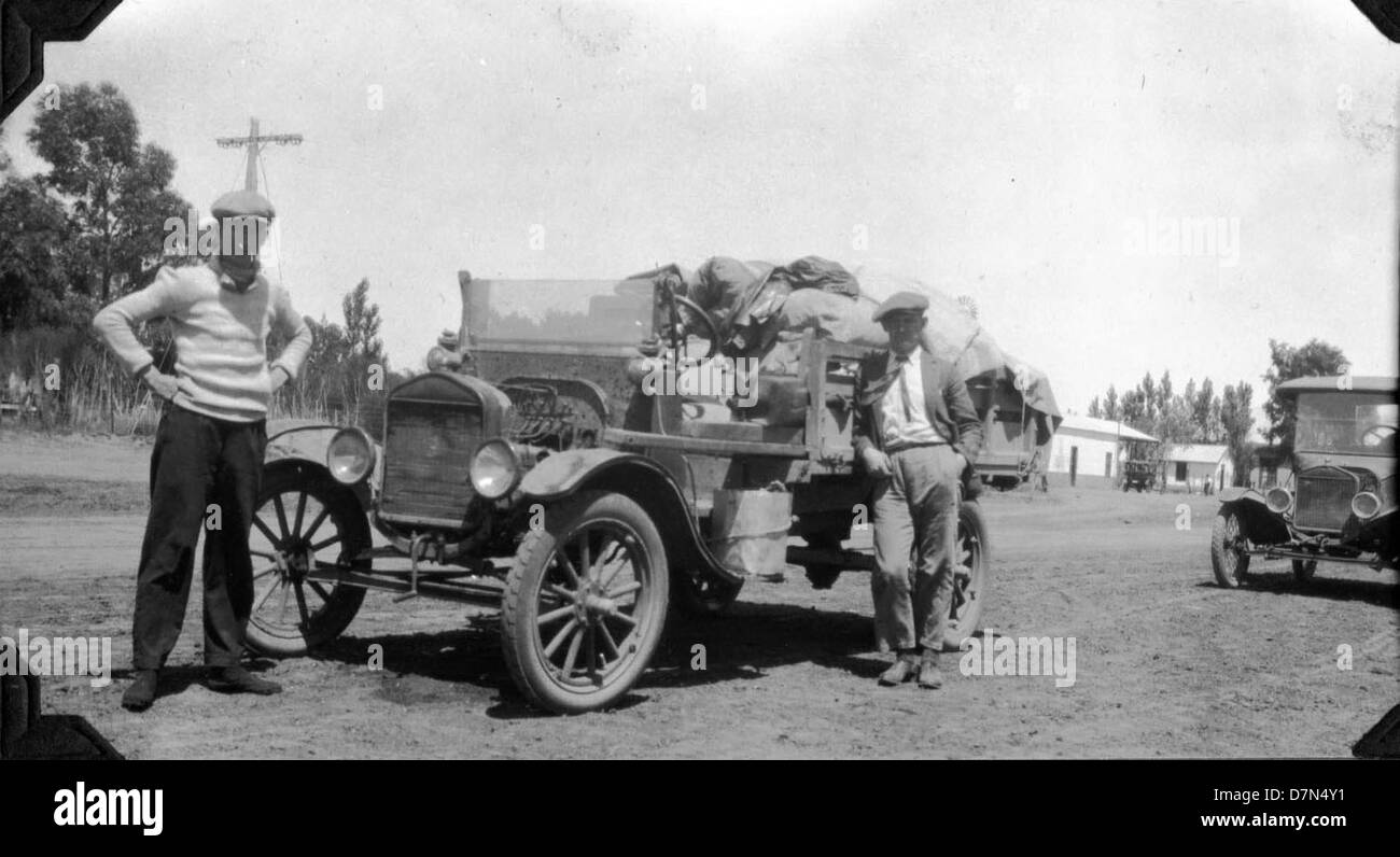 Elmer Riggs, Felipe Mendez, and others are seen standing by an ...