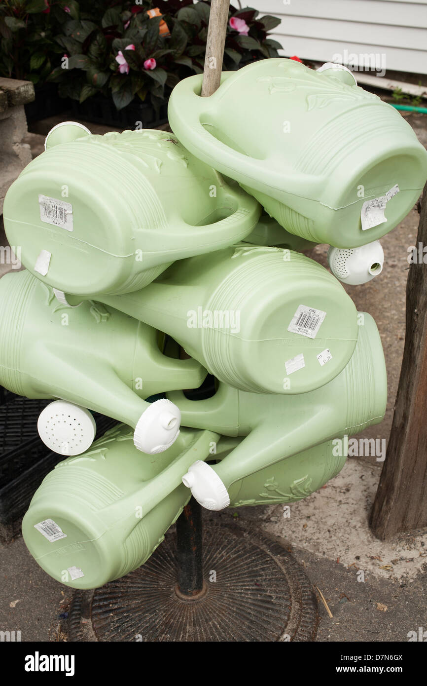 A western Massachusetts nursery has Spring selection of watering cans for sale. Stock Photo