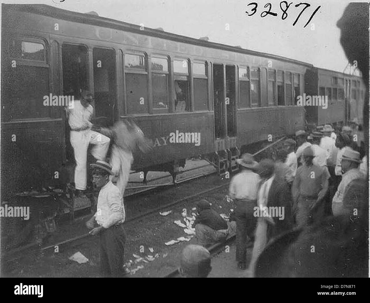 Railroad pay car with men waiting in line Stock Photo