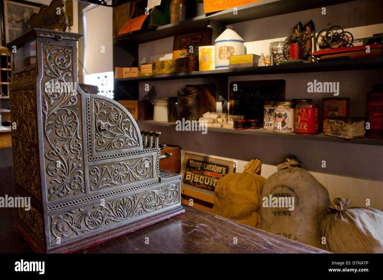 New York, Syracuse, Erie Canal Museum. Vintage store display with ornate cash register. Stock Photo