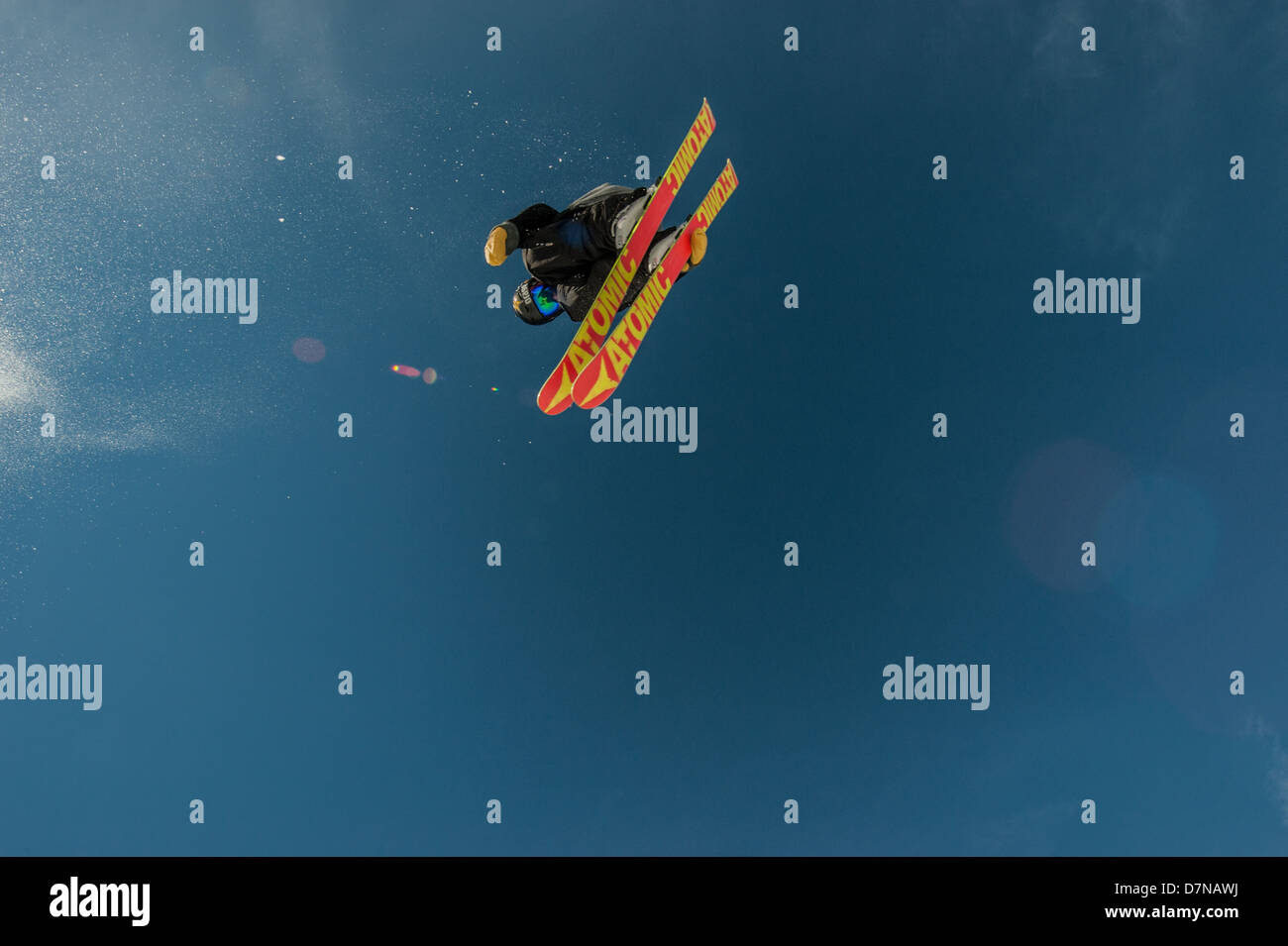 Close up shot of a skier executing a trick in a snowpark Stock Photo