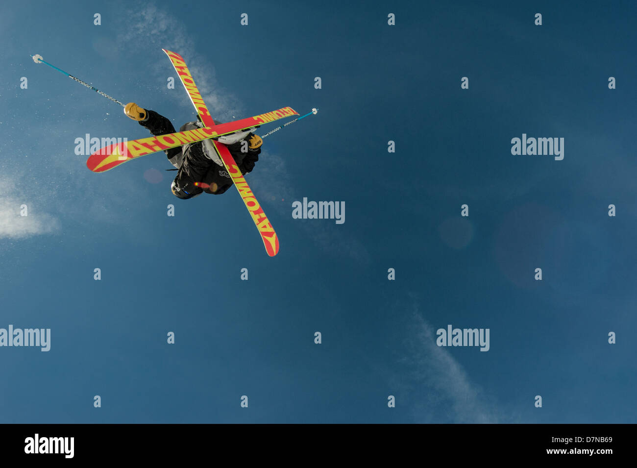 Close up shot of a skier executing a trick in a snowpark Stock Photo