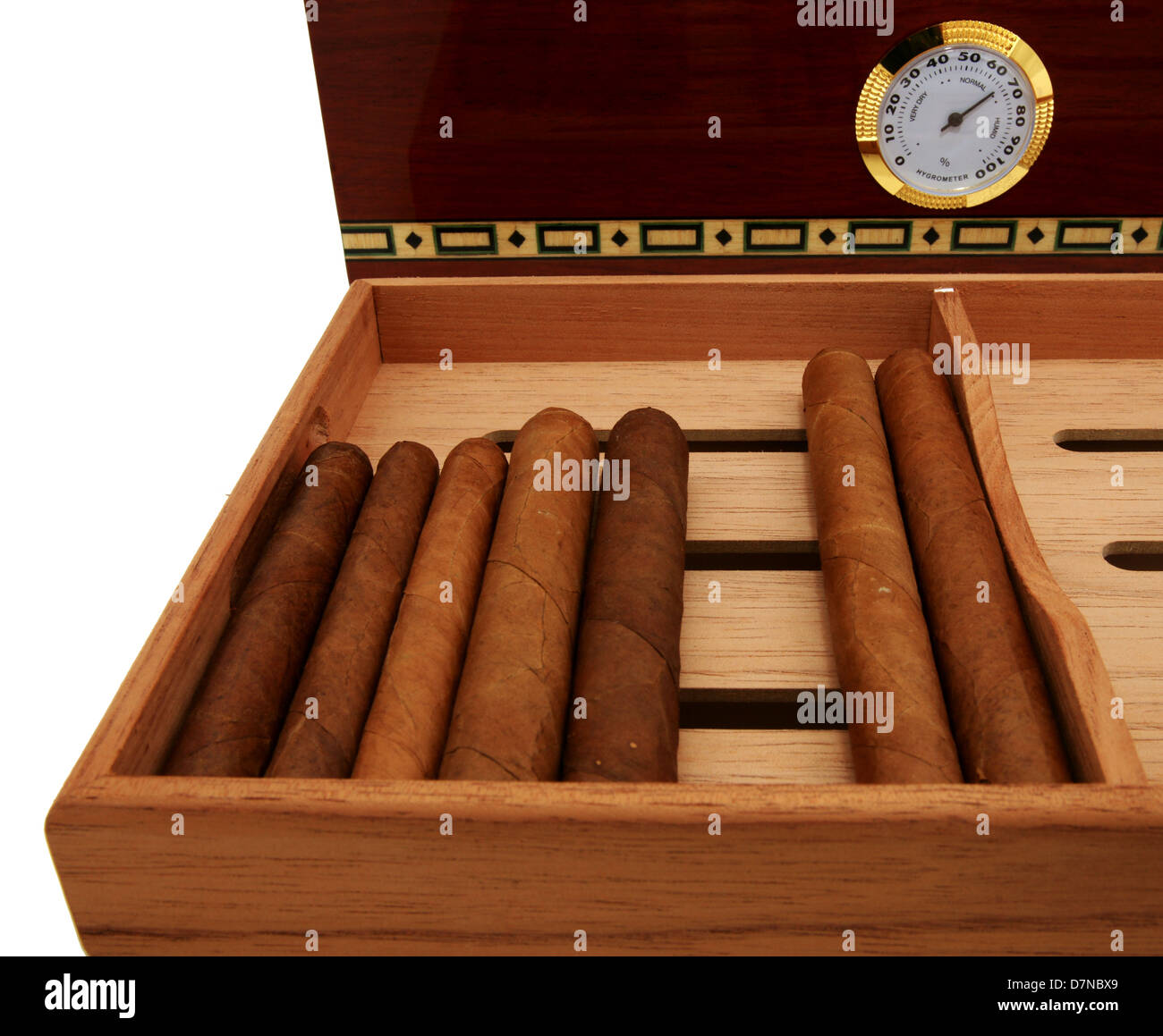Cigars on the tray in front of  elegant cigar humidor. Close up Stock Photo