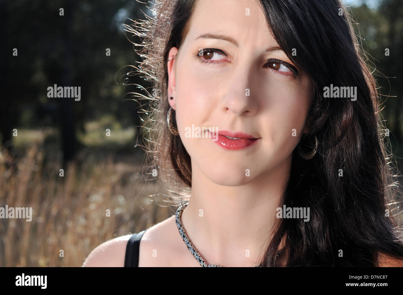 Close-up portrait of a young woman in a forest Stock Photo - Alamy