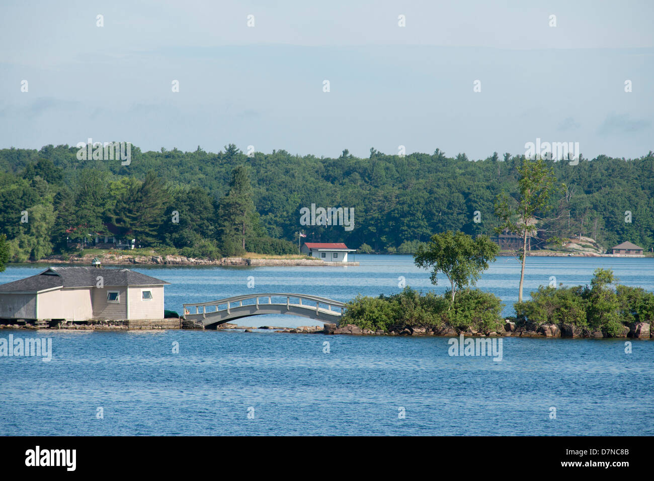 New York, St. Lawrence Seaway, Thousand Islands. Island home with bridge. Stock Photo