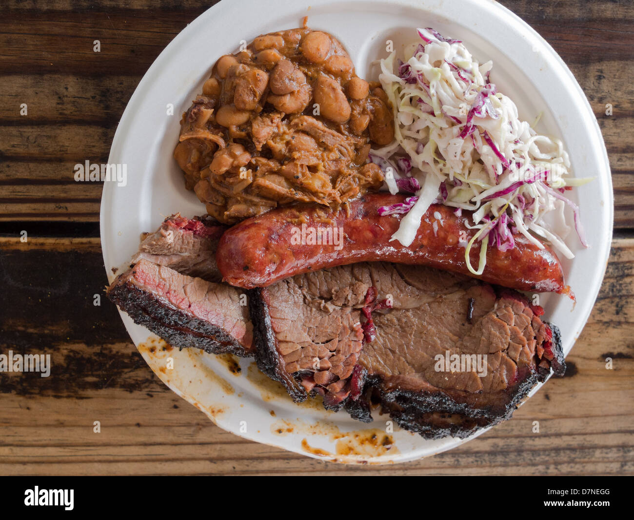 Beef brisket and sausage plate at Franklin BBQ Stock Photo