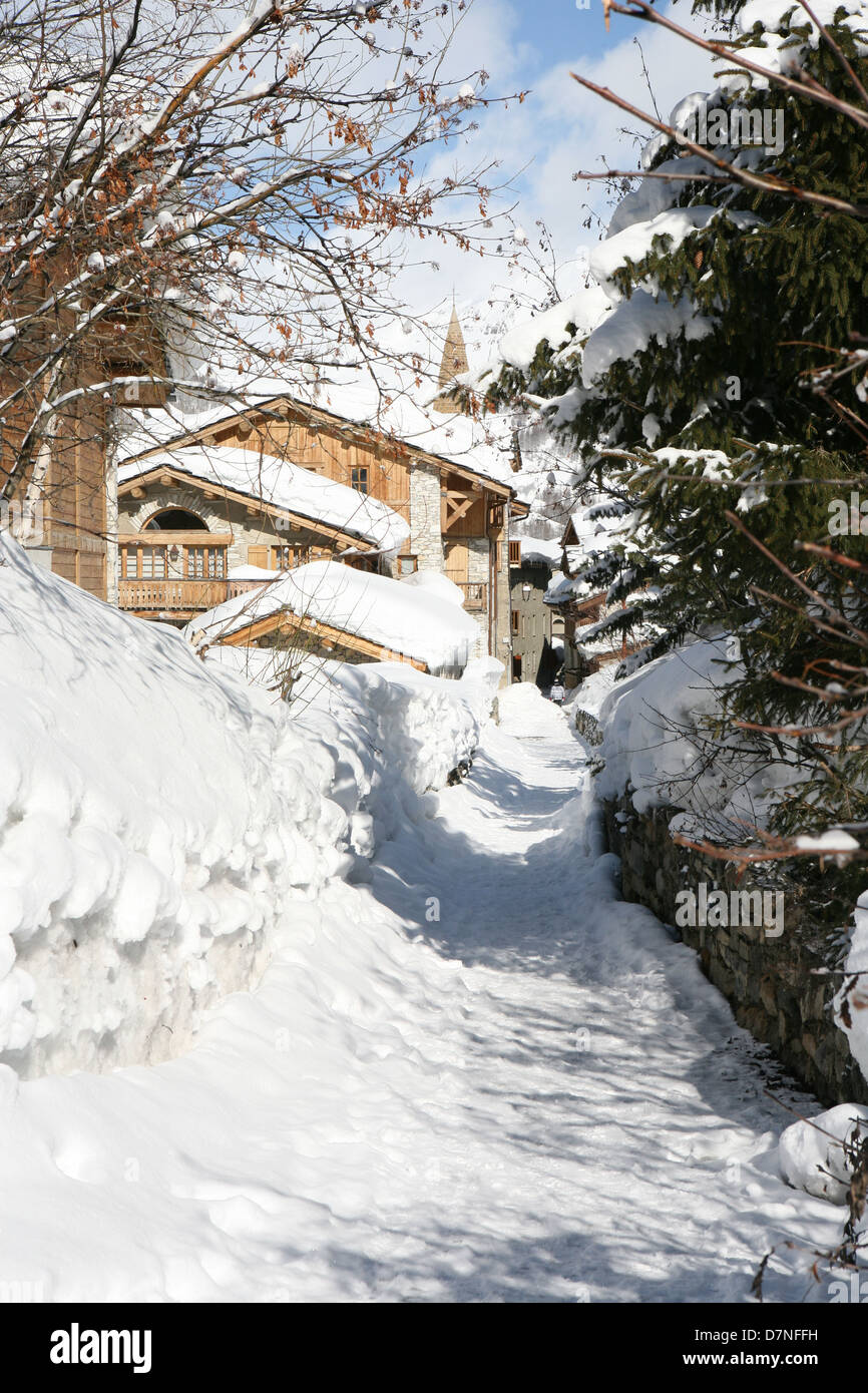 Footpath through the old village of Val d'Isere Savoie France Stock Photo