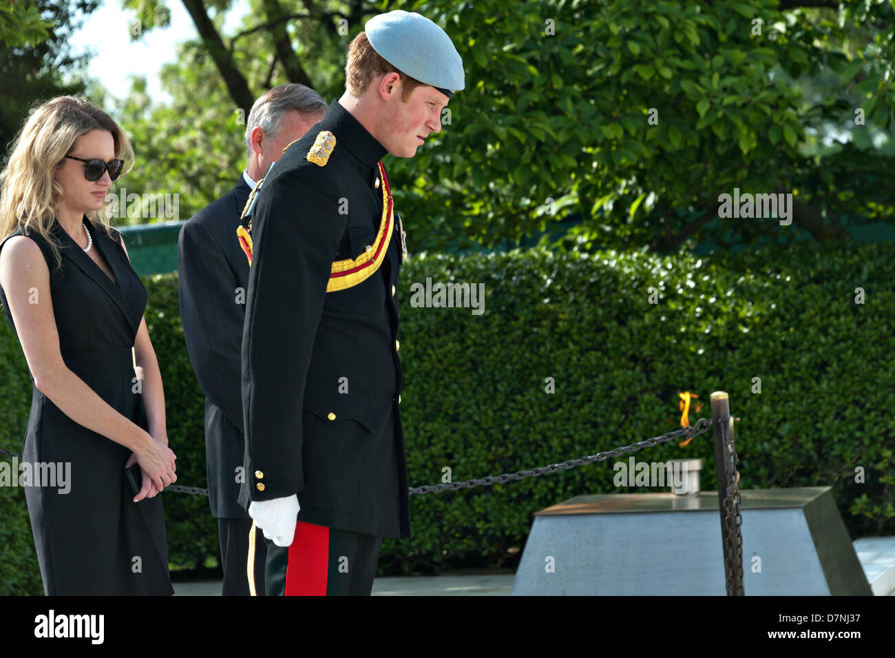 HRH Prince Harry of Wales places flowers at President John F. Kennedy's gravesite at Arlington National Cemetery May 10, 2013 in Arlington, VA. Stock Photo