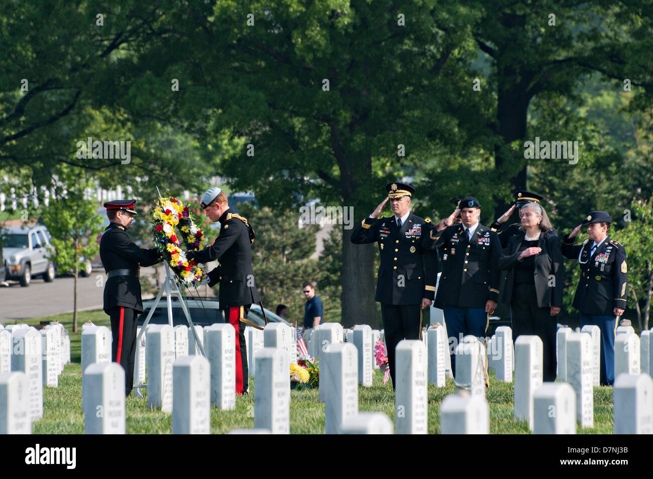 HRH Prince Harry of Wales and US Army Maj. Gen. Michael Linnington pay respect to Section 60 of Arlington National Cemetery May 10, 2013 in Arlington, VA. Section 60 is the burial grounds for US service members killed in the global war on terror since 2001. Stock Photo