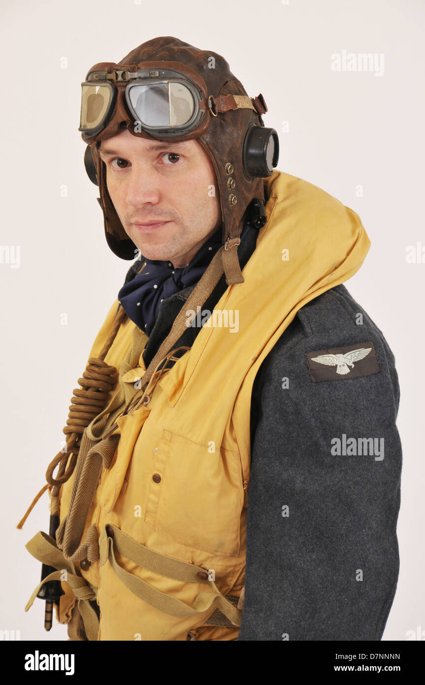 WW2 RAF pilot/crew member wearing flying helmet & 'Mae West' life jacket. Stock Photo