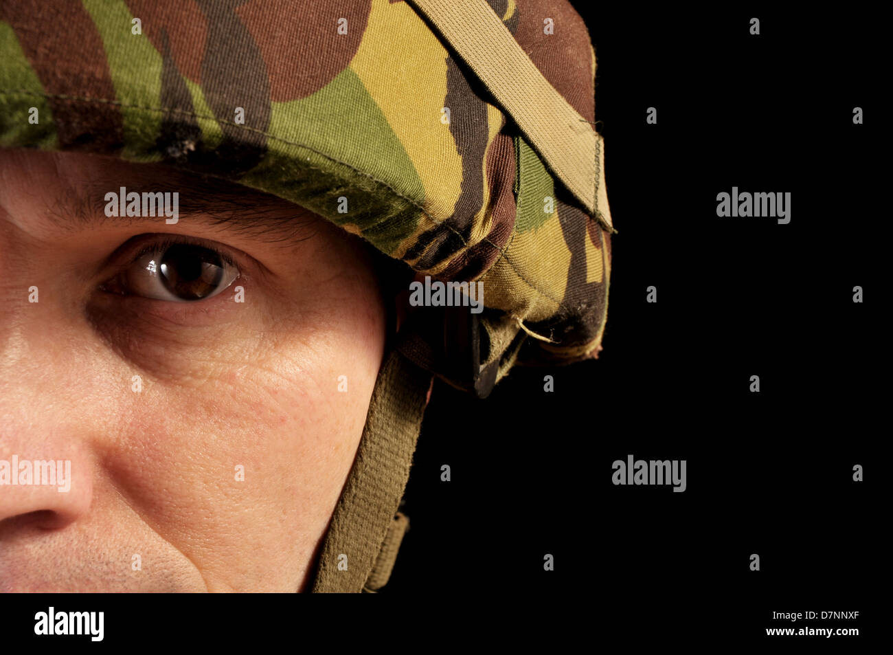 Close up portrait of a soldier's eye. Soldier is wearing British