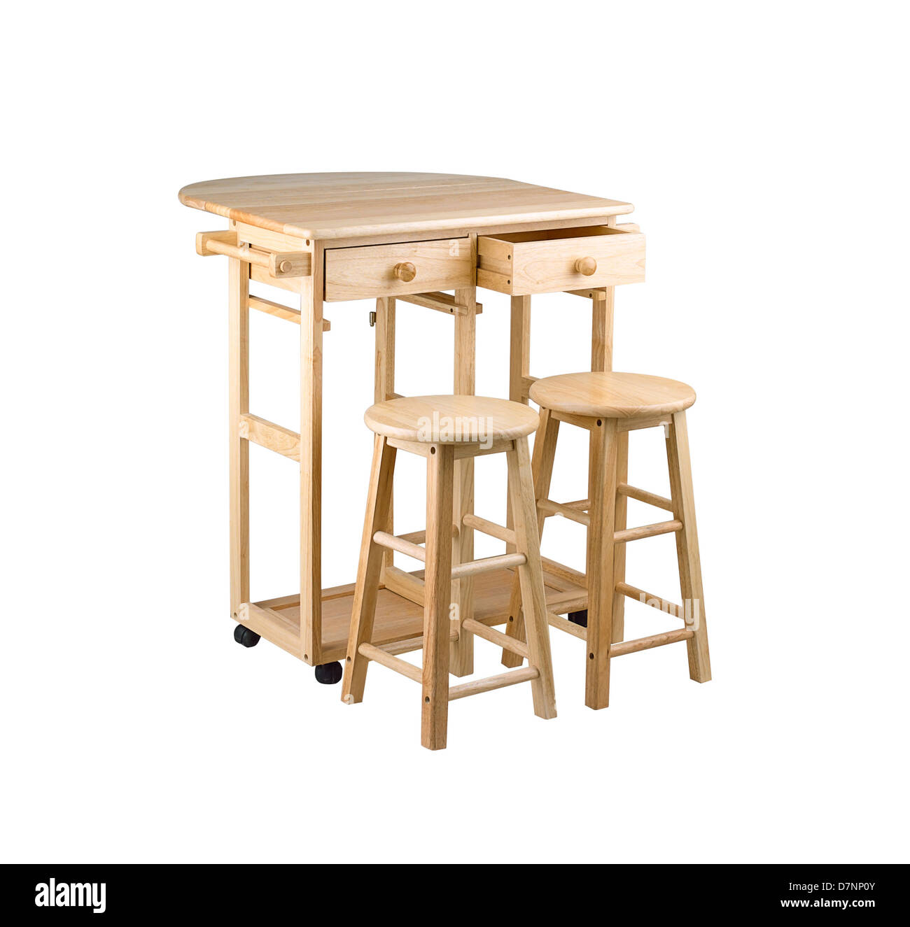 Folding and movable wooden table with drawers for small kitchen area Stock Photo