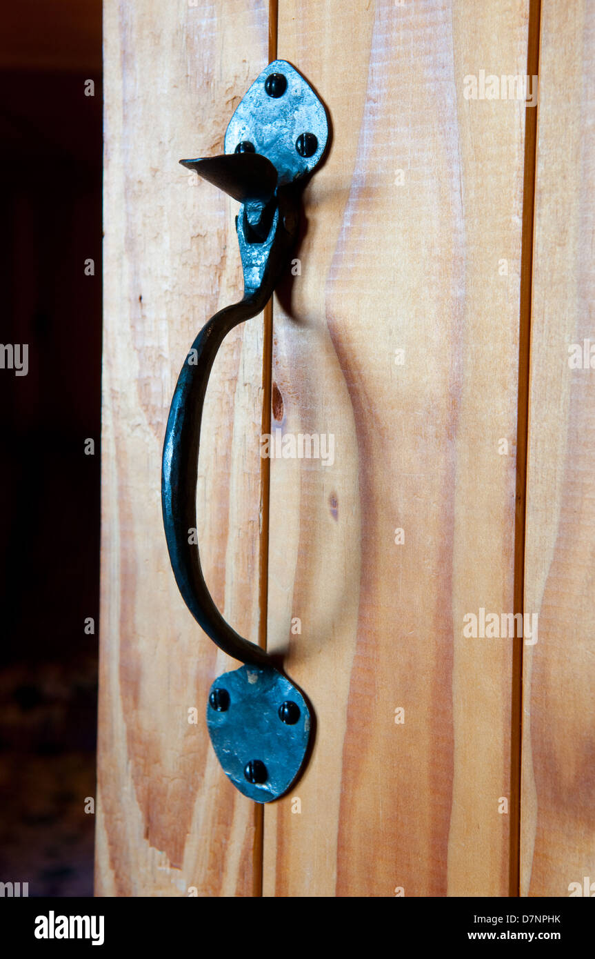 Door handle of an open door Stock Photo Alamy
