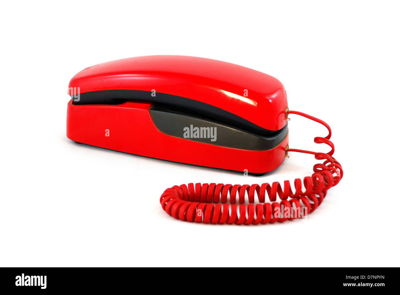 Little and old red and black phone isoled on white background Stock