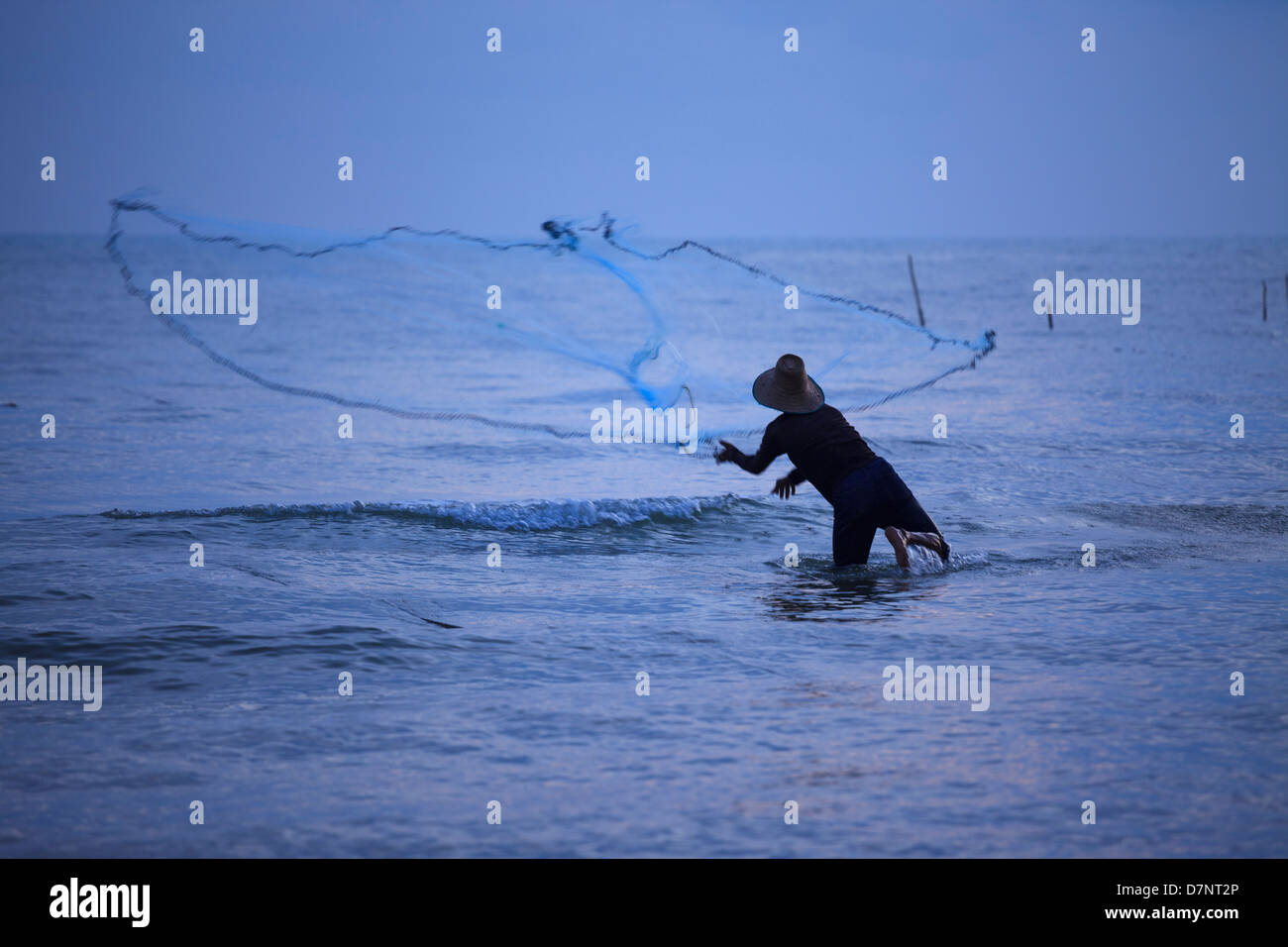 fisherman fishing net sea blue Thailand Songkhla Stock Photo