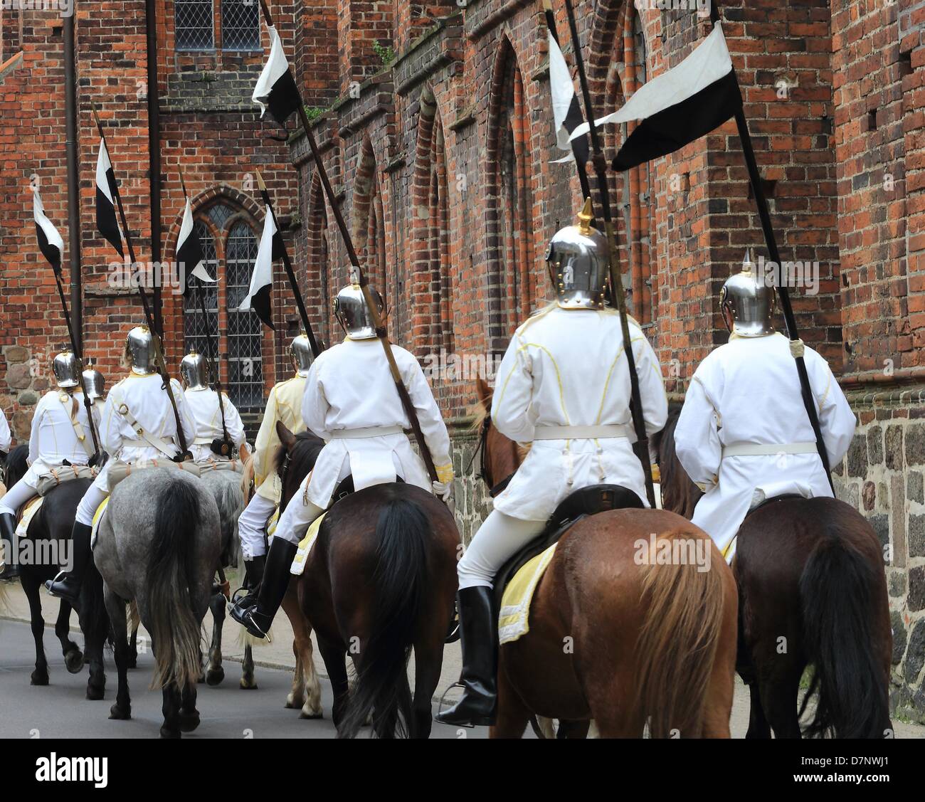 Members of the traditional Magdeburg Hussar Regiment Number 10 arrive for a ceremonial roll call wearing historic uniforms on Marktplatz in Stendal, Germany, 11 May 2013. Events are being held to mark the 200th anniversary of the calvary regiment's formation in the Prussian Army in Stendal. Photo: JENS WOLF Stock Photo