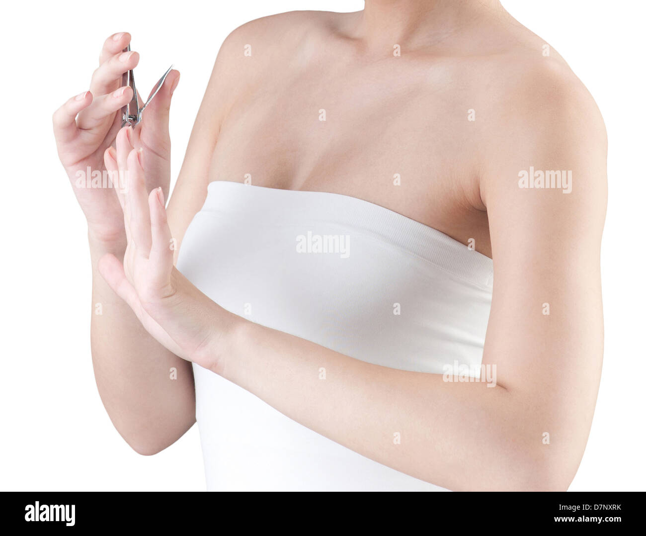 A woman cutting her fingernails Stock Photo