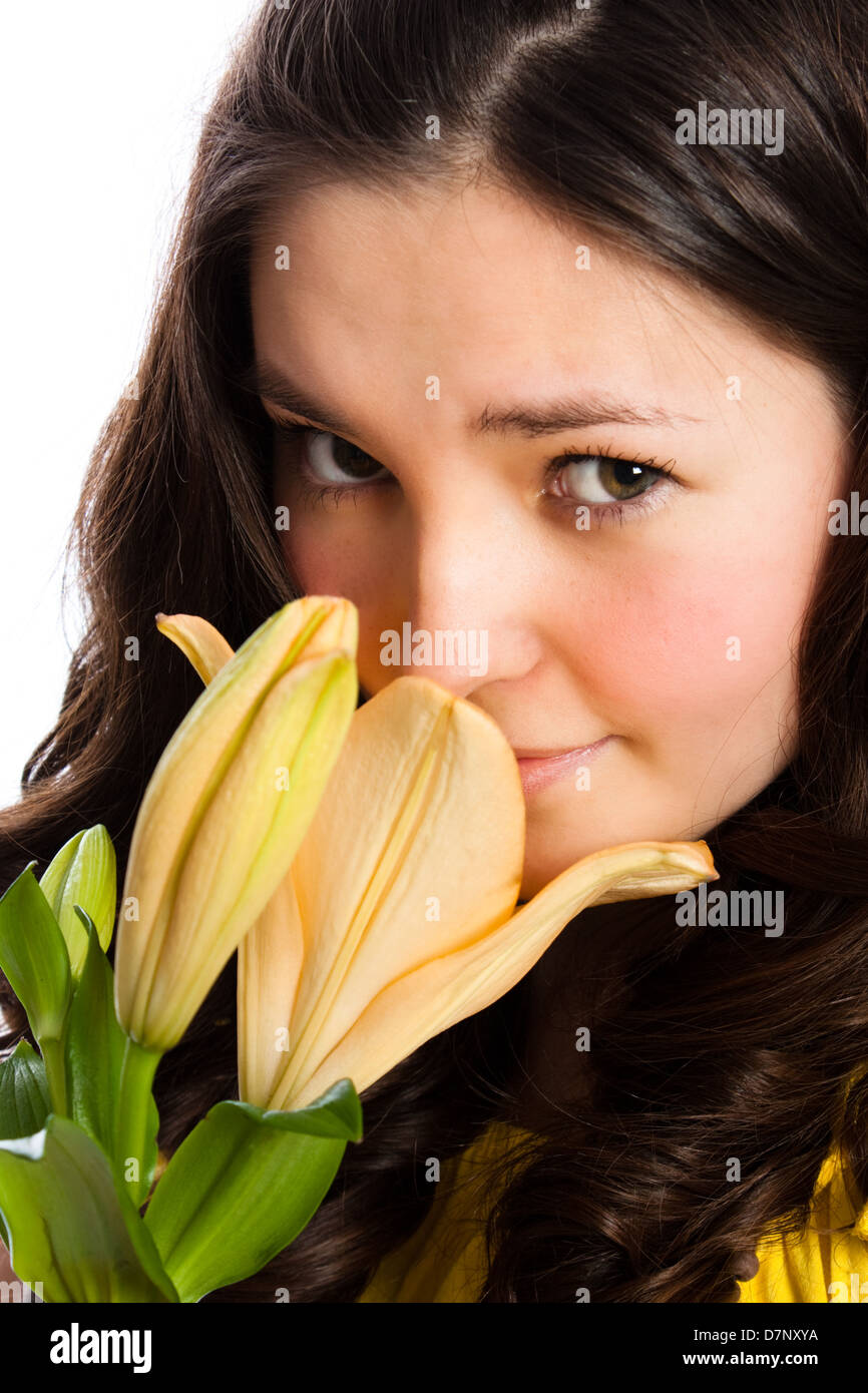 Cute young woman with flower - on white background Stock Photo - Alamy