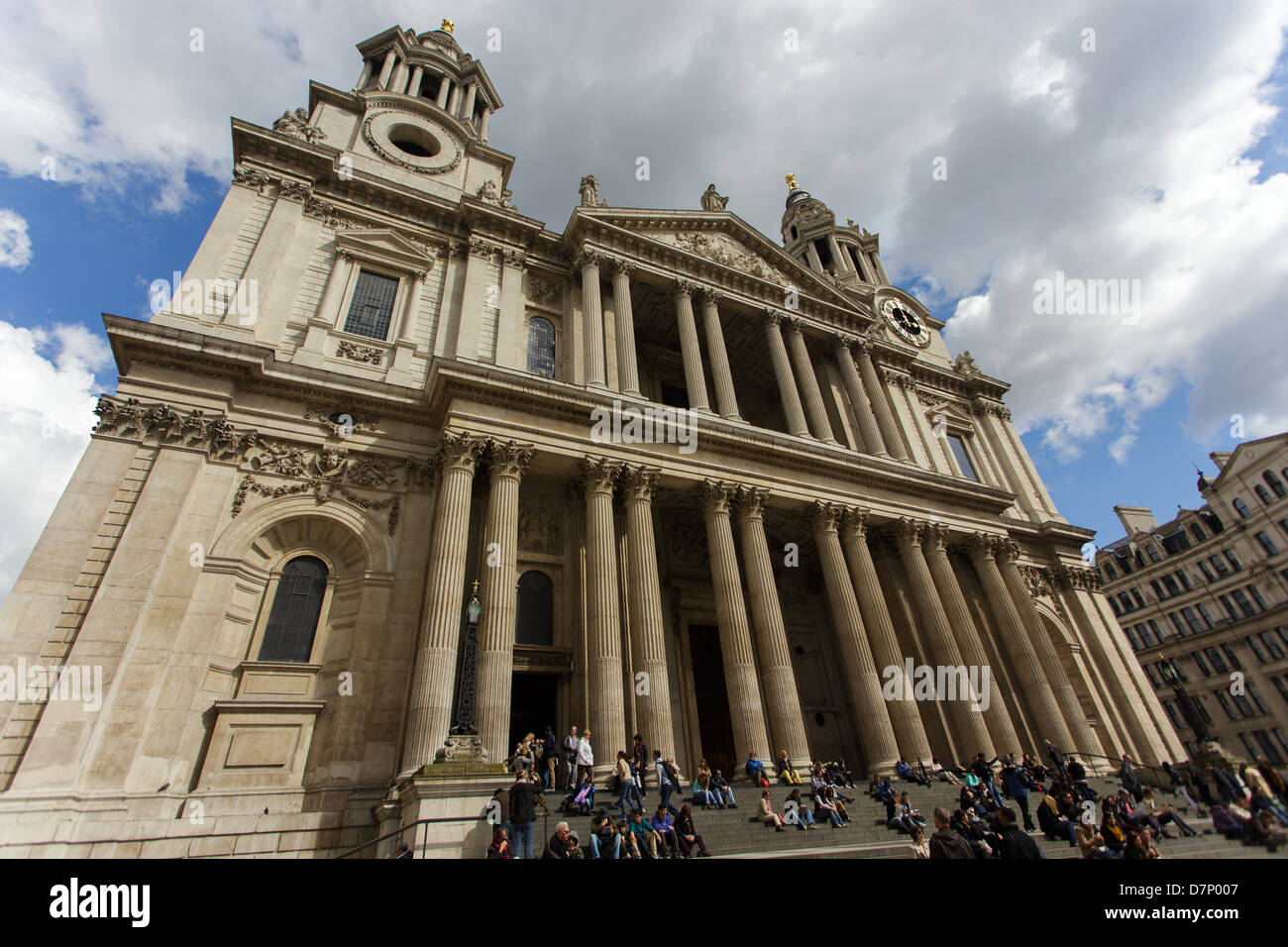 Dynamic distorted view of St Paul cathedral in London, many tourist are ...