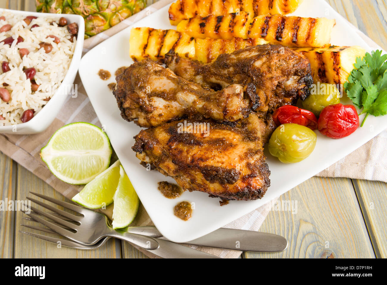 Jerk Chicken Jamaican marinated BBQ chicken served with grilled
