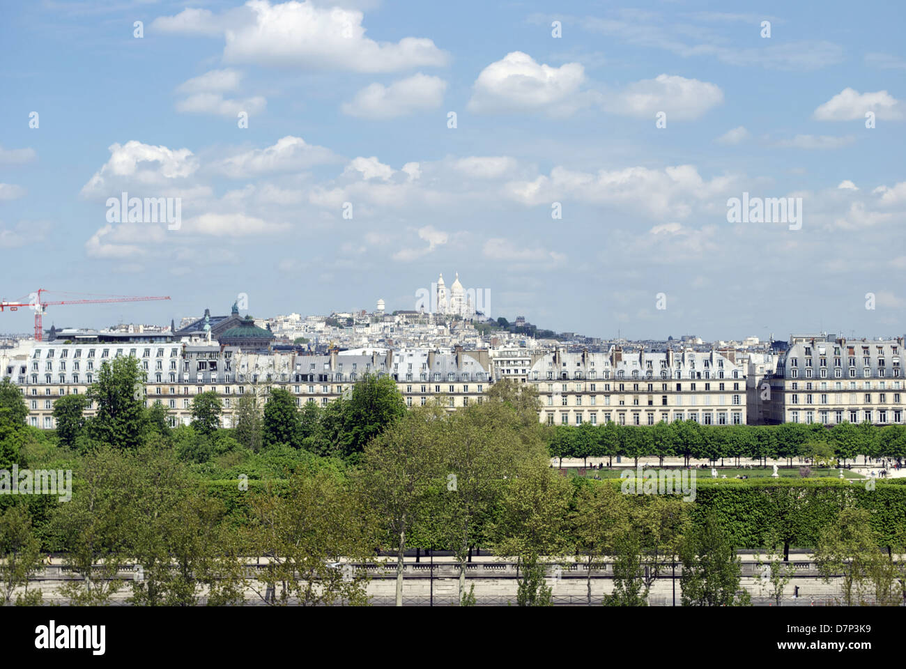 view across the seine paris sacred heart church on hill lourve in the foreground Stock Photo