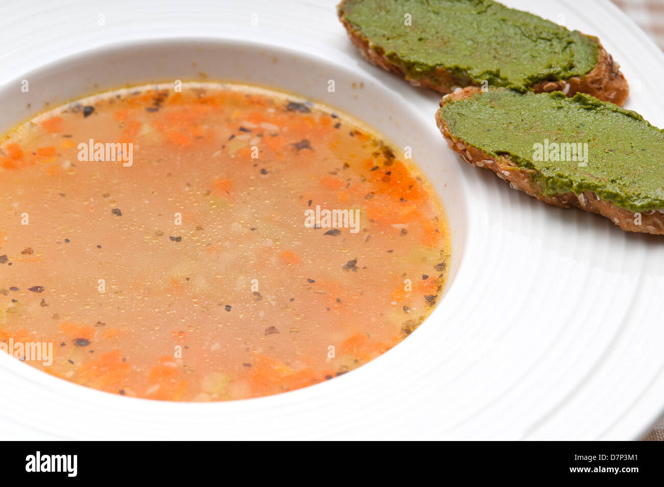 classic Italian minestrone " passato"soup with pesto crostini on side