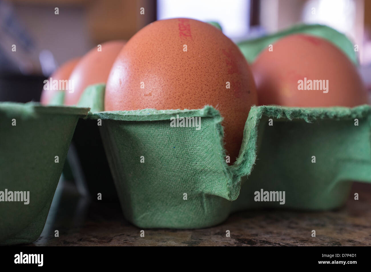 Eggs in open carton Stock Photo