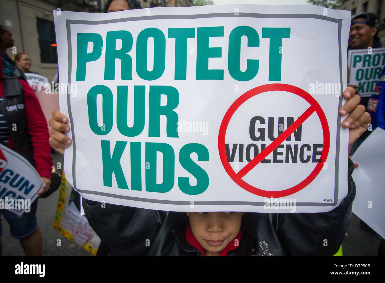 Hundreds march through the streets of the South Bronx in New York in an ...