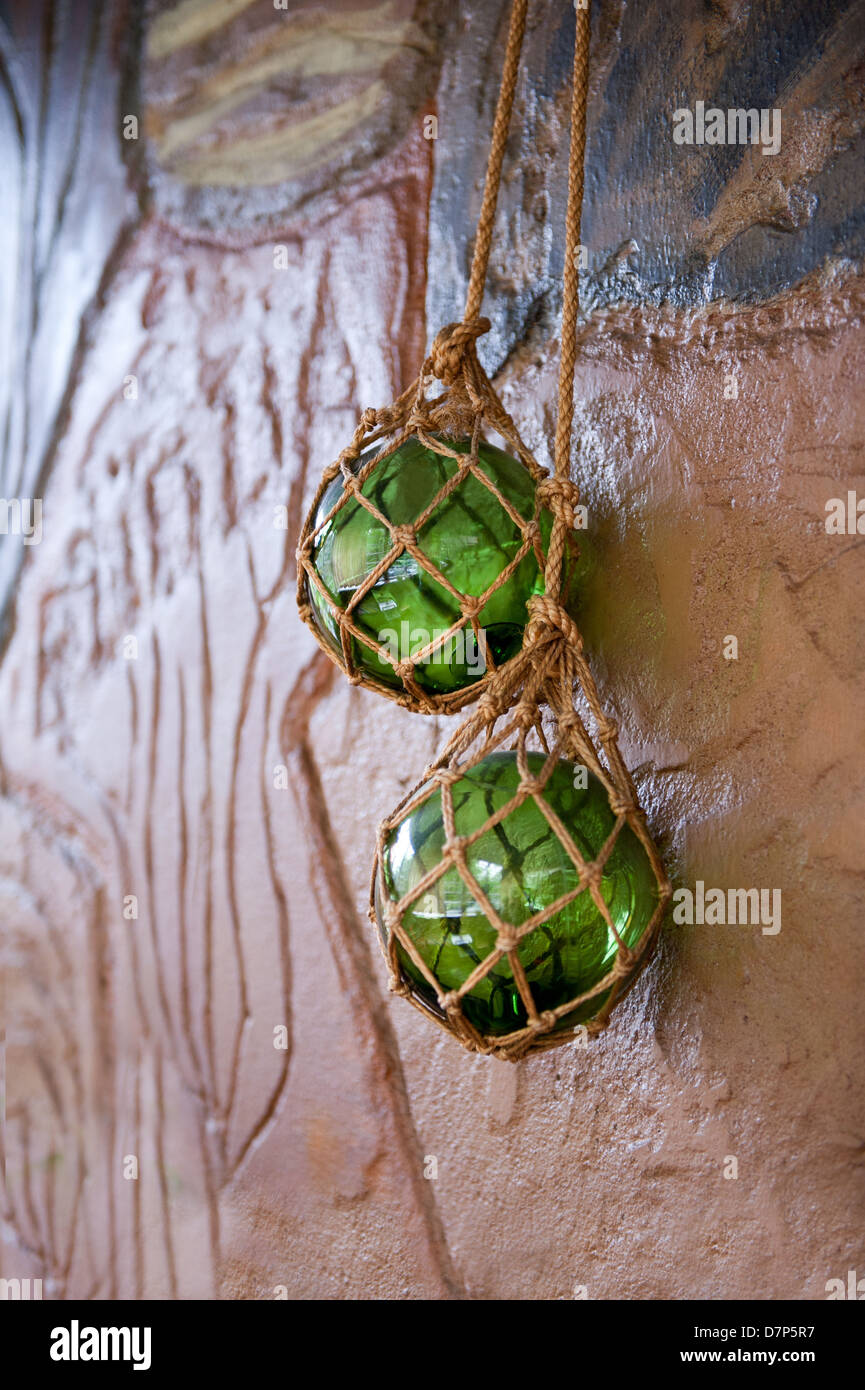green glass balls hanging on the wall Stock Photo Alamy