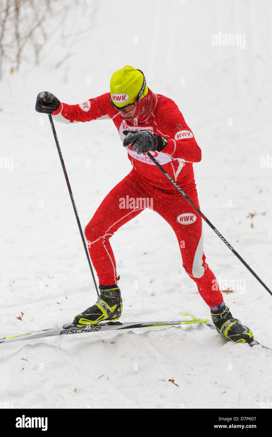 Alec Steward climbs a hill on the trail between Knife Lake and Mora during the Mora Vasaloppet cross country ski race. Stock Photo
