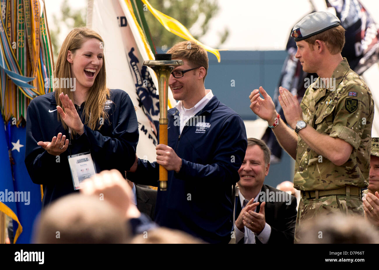 Colorado Springs, Colorado, U.S. - 11th May 2013 -  PRINCE HARRY attends the Opening Ceremonies of the 2013 Warrior Games, a competition for ill and injured service members, with Olympic gold medalist MISSY FRANKLIN L and torch bearer U.S. Navy LT. BRAD SNYDER. A total of 260 service members with amputations, spinal cord injuries, post-traumatic stress disorder and traumatic brain injury are expected to take part in the six days of competition. Credit Image: © Brian Cahn/ZUMAPRESS.com Stock Photo