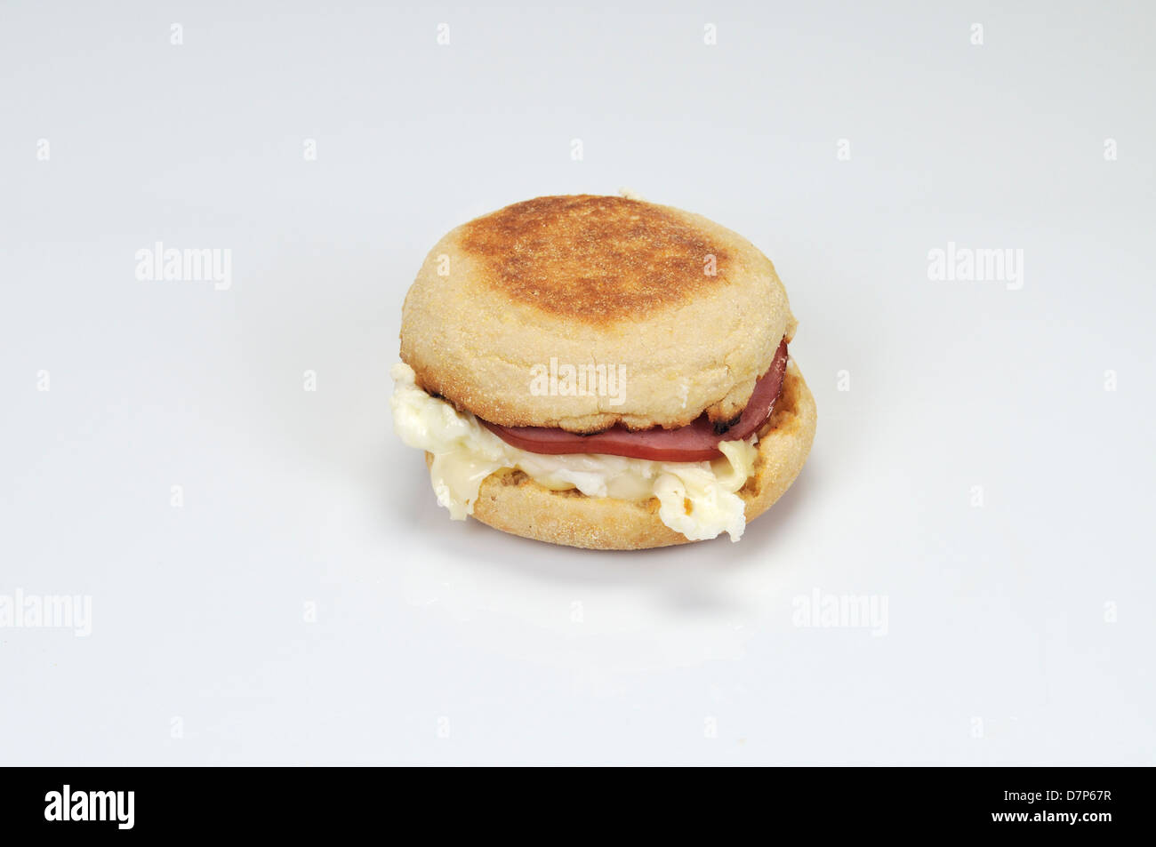 McDonald's egg white delight McMuffin with canadian bacon and white cheddar cheese on a  english muffin on white background. Stock Photo