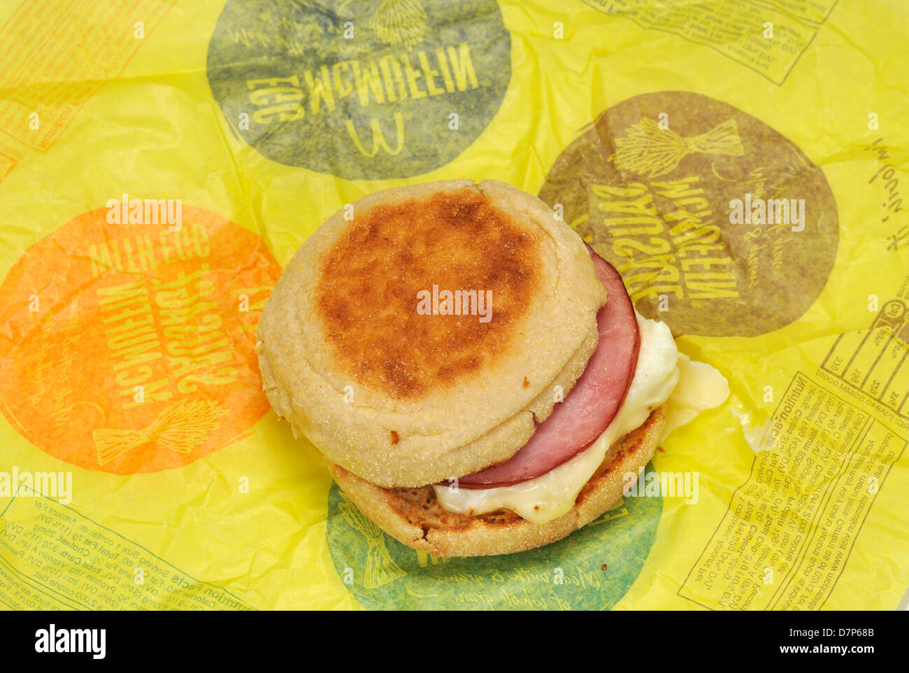 McDonald's Egg White Delight McMuffin breakfast sandwich on paper wrapper, cut out. USA Stock Photo