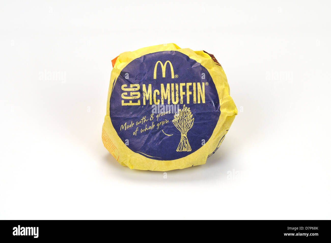 McDonald's Egg McMuffin in paper wrapper packaging on white background, cutout. USA Stock Photo