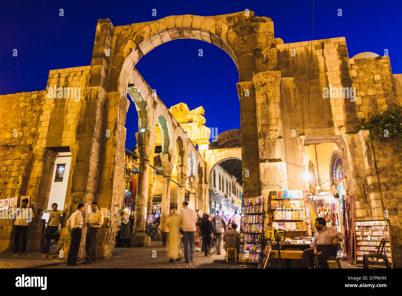 Jupiter Gate at Al Hamadiyya Souq and religious book shop stall