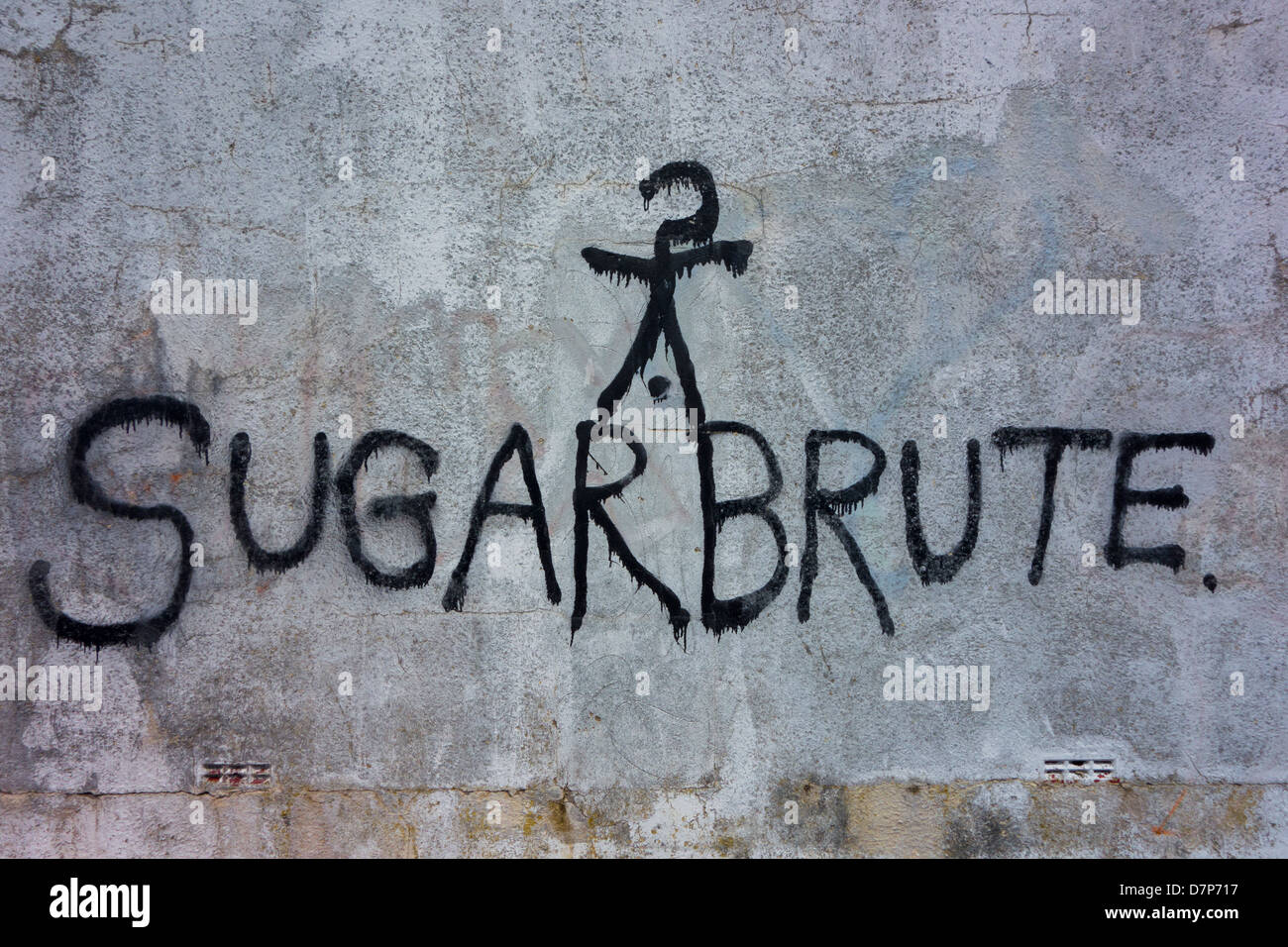 Graffiti on a wall reading 'SugarBrute' Stock Photo