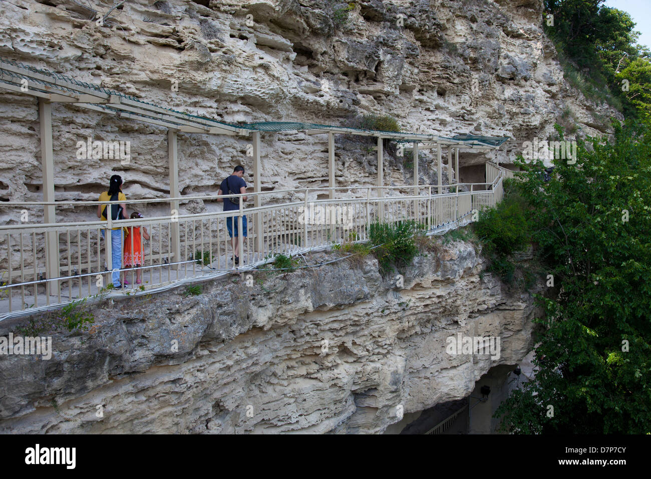 Bulgaria, Europe, Black Sea Coast, The 6th Century Aladzha Monastery cut into the Cliff, Sightseers. Stock Photo