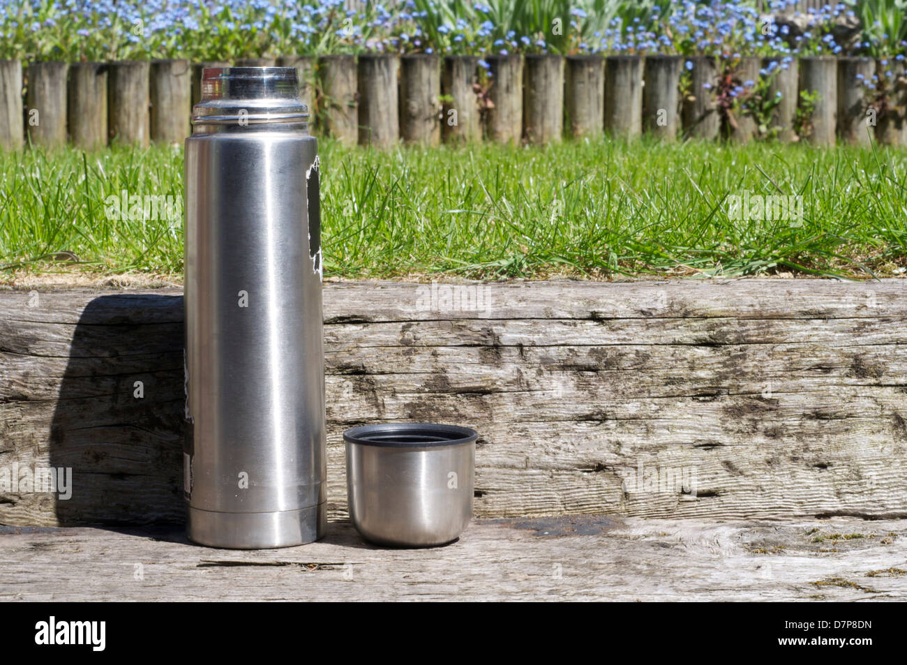 Green Plastic Thermos Flask With Cup On White Background Stock Photo,  Picture and Royalty Free Image. Image 10033732.