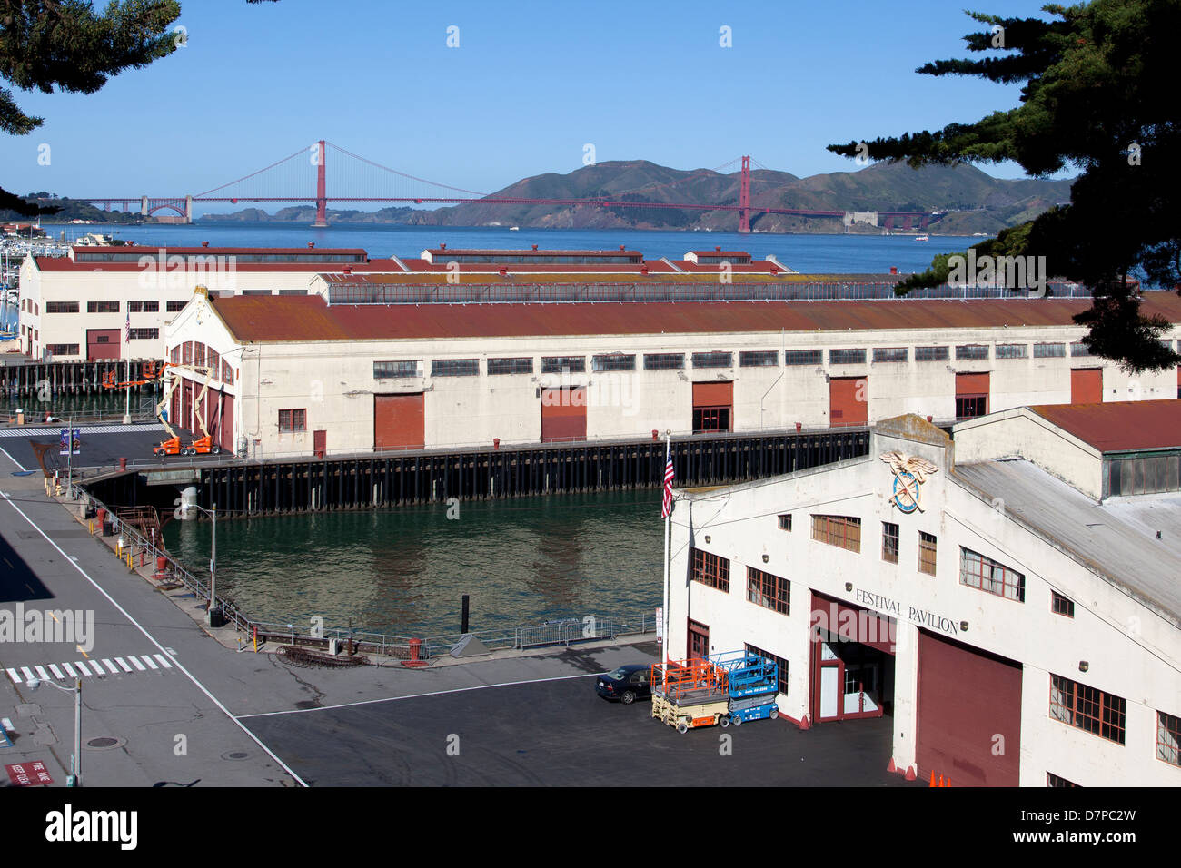 Rooftops of the Fort Mason Center with The Golden Gate Bridge in the ...